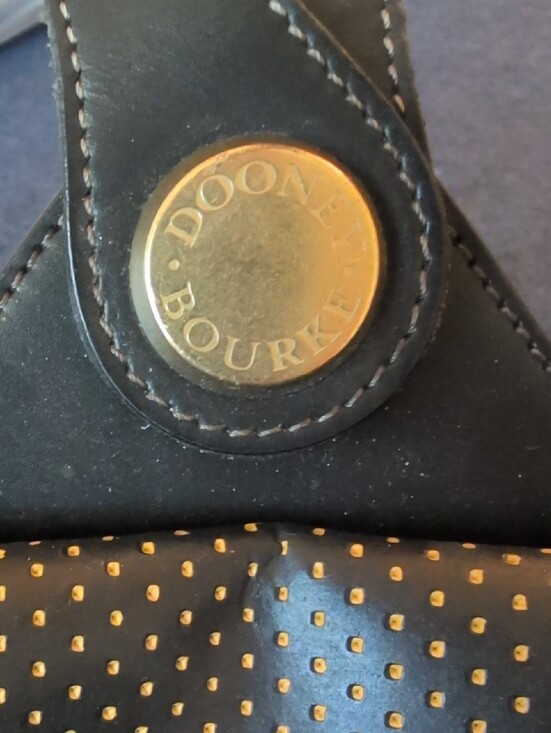 Dooney & Bourke Black Polka Dot Backpack with Gold Hardware